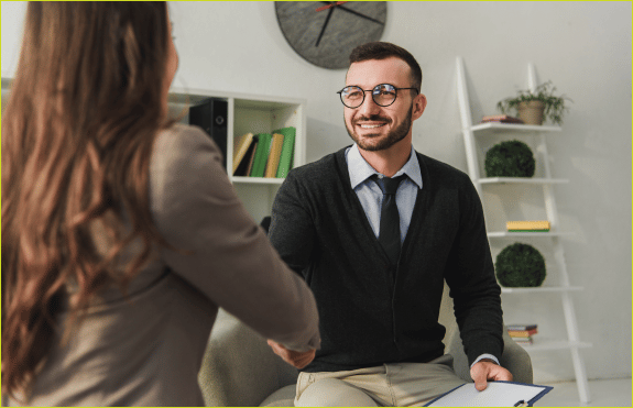 mental health treatment in orange county | happy psychologist and patient shaking hands in do 7FRLHWS 1